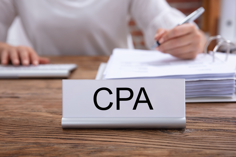 Nameplate on desk with CPA written on it