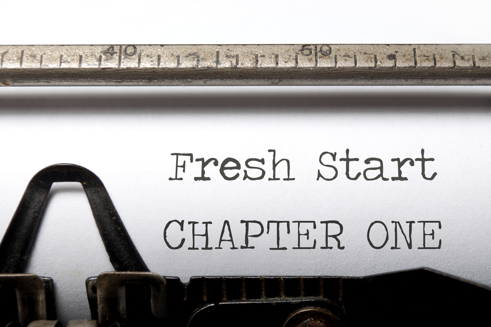 "Fresh Start Chapter One" typed out on typewriter