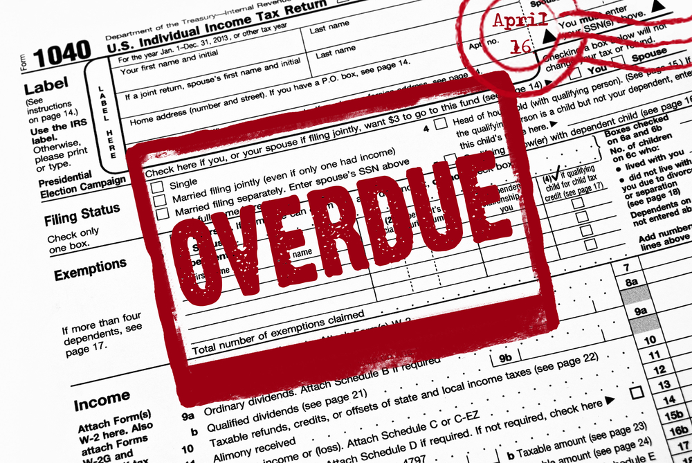 Red overdue stamp on IRS form 1040